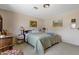 Bright bedroom showcases a large window, a dresser and a king-size bed at 1559 S Padre Rd, Apache Junction, AZ 85119