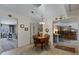 Cozy dining area adjacent to kitchen with views into living room at 1559 S Padre Rd, Apache Junction, AZ 85119