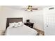 Bedroom featuring wood floors, a bed, a ceiling fan, and a closet at 16414 S 36Th St, Phoenix, AZ 85048