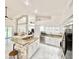 Open-concept kitchen with granite countertops, stainless steel appliances, and a breakfast bar at 16414 S 36Th St, Phoenix, AZ 85048