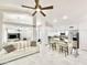 Bright and airy living space featuring an open layout connecting the living room and kitchen areas at 16414 S 36Th St, Phoenix, AZ 85048