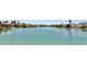 Scenic water view showing calm lake waters surrounded by waterfront homes in a tranquil neighborhood at 16414 S 36Th St, Phoenix, AZ 85048