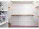 Functional walk-in closet providing ample storage space with built-in shelving at 17585 N Coyote Lakes Pkwy, Surprise, AZ 85378