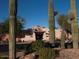 Coyote Lakes clubhouse framed by desert vegetation at 17585 N Coyote Lakes Pkwy, Surprise, AZ 85378