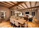 Open-concept living room and dining area with hardwood floors and fireplace at 19054 N 97Th Pl, Scottsdale, AZ 85255