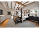 A bright primary bedroom with a four-poster bed, accent furniture, and stylish decor creates an inviting space at 19054 N 97Th Pl, Scottsdale, AZ 85255