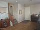 Inviting entryway featuring tile floors, stairway to the second level, and an elegant furnishing at 21013 W Wycliff Dr, Buckeye, AZ 85396