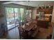 Open kitchen with dining area, sliding glass door leading to outdoor patio at 21013 W Wycliff Dr, Buckeye, AZ 85396