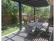 Inviting patio area, complete with dining furniture, perfect for outdoor entertainment and leisure at 21013 W Wycliff Dr, Buckeye, AZ 85396