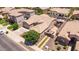 Aerial view of the property highlights the backyard entertaining space with a pool, spa and outdoor kitchen at 21275 E Russet Rd, Queen Creek, AZ 85142