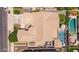 Bird's eye view of the property with a pool, spa, covered patio, and outdoor kitchen at 21275 E Russet Rd, Queen Creek, AZ 85142