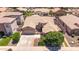 Expansive aerial view of the property showcases the beautiful landscaping and circular entrance at 21275 E Russet Rd, Queen Creek, AZ 85142