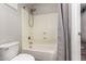 Standard bathroom features a shower-tub combination, toilet, and tiled walls with neutral gray color at 21275 E Russet Rd, Queen Creek, AZ 85142