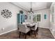 Formal dining room with seating for six and stylish decor at 21275 E Russet Rd, Queen Creek, AZ 85142