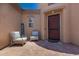 Inviting front entry with a seating area and stylish decor, creating a warm and welcoming atmosphere at 21275 E Russet Rd, Queen Creek, AZ 85142