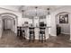 Bright kitchen with granite countertops and island seating at 21275 E Russet Rd, Queen Creek, AZ 85142