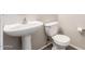 Bathroom with pedestal sink and toilet at 22125 N 29Th Ave # 158, Phoenix, AZ 85027