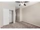 Carpeted bedroom features closet and neutral color scheme at 22125 N 29Th Ave # 158, Phoenix, AZ 85027