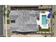 Aerial view of a home highlighting a backyard oasis with a pool, jacuzzi, and pergola at 3118 E Gary Way, Phoenix, AZ 85042