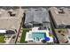 Stunning aerial view of a home with a backyard pool, spa, and outdoor entertaining area at 3118 E Gary Way, Phoenix, AZ 85042