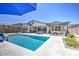 The backyard features a private pool, pergola, and dining area for outdoor entertaining at 3118 E Gary Way, Phoenix, AZ 85042