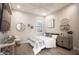 Bright bedroom features stylish decor, including a decorative mirror, wall art, and wood floors at 3118 E Gary Way, Phoenix, AZ 85042