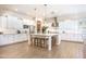 Spacious kitchen featuring a large island, stainless steel appliances, and modern design at 3118 E Gary Way, Phoenix, AZ 85042