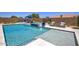 A sparkling pool and integrated jacuzzi with an outdoor seating area offer ultimate relaxation at 3118 E Gary Way, Phoenix, AZ 85042