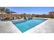 Sparkling pool with jacuzzi, outdoor fireplace and seating, perfect for entertaining or relaxing at 3118 E Gary Way, Phoenix, AZ 85042
