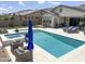 Gorgeous pool with spa, lounge chairs, and a serene backyard oasis at 3118 E Gary Way, Phoenix, AZ 85042