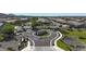 Entrance to a gated community with lush landscaping, providing security and exclusivity for residents at 3118 E Gary Way, Phoenix, AZ 85042