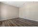 Bedroom with laminate floors, neutral walls, and modern baseboards at 31409 N 58Th Pl, Cave Creek, AZ 85331