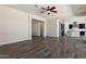 Open living room with tile flooring and easy access to the kitchen and dining area at 31409 N 58Th Pl, Cave Creek, AZ 85331