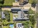 Aerial view of the property displaying the house, landscaping, pool, and surrounding neighborhood at 325 W Solano Dr, Phoenix, AZ 85013