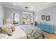 Bright bedroom features a cozy window seat and blue accents at 325 W Solano Dr, Phoenix, AZ 85013