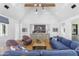 Bright living room with high ceilings, designer furnishings, and elegant decor throughout at 325 W Solano Dr, Phoenix, AZ 85013