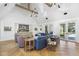 Bright living room with high vaulted ceilings, natural light, and stylish furniture at 325 W Solano Dr, Phoenix, AZ 85013
