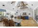 Open floor plan showcasing the living room, dining area, and kitchen with high ceilings and modern design at 325 W Solano Dr, Phoenix, AZ 85013