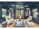 Home office with custom built-ins, natural lighting, and contemporary decor at 325 W Solano Dr, Phoenix, AZ 85013