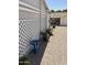 View of home's side yard, driveway and additional storage at 3330 E Main St # 430, Mesa, AZ 85213