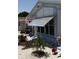 Charming home exterior with decorative landscaping and shaded awning over the windows at 3330 E Main St # 430, Mesa, AZ 85213