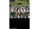 Aerial view of several homes with solar panels and swimming pools in their yards at 363 W Bruce Ave, Gilbert, AZ 85233