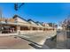 Vibrant commercial building featuring unique architecture, outdoor seating, and street-level access for businesses at 363 W Bruce Ave, Gilbert, AZ 85233