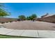 Expansive gravel common area with trees offers a unique outdoor space at 363 W Bruce Ave, Gilbert, AZ 85233