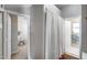 Bright hallway features wood floors and access to the bathroom and bedroom at 363 W Bruce Ave, Gilbert, AZ 85233