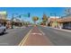 Daytime view of a street with businesses, pedestrian crossings, and vehicle traffic at 363 W Bruce Ave, Gilbert, AZ 85233