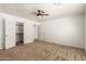 This main bedroom is equipped with a ceiling fan and large closet at 3646 E Rousay Dr, San Tan Valley, AZ 85140