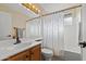 Bright bathroom featuring a tub and shower combination, matching vanity, and a neutral palette at 3651 W Escuda Dr, Glendale, AZ 85308