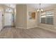 Inviting living room featuring light wood floors and an open floor plan at 3651 W Escuda Dr, Glendale, AZ 85308