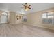 Inviting living room featuring light wood floors and an open floor plan at 3651 W Escuda Dr, Glendale, AZ 85308
